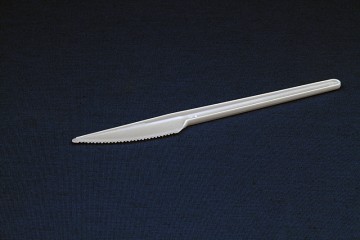 нож одноразовый белый